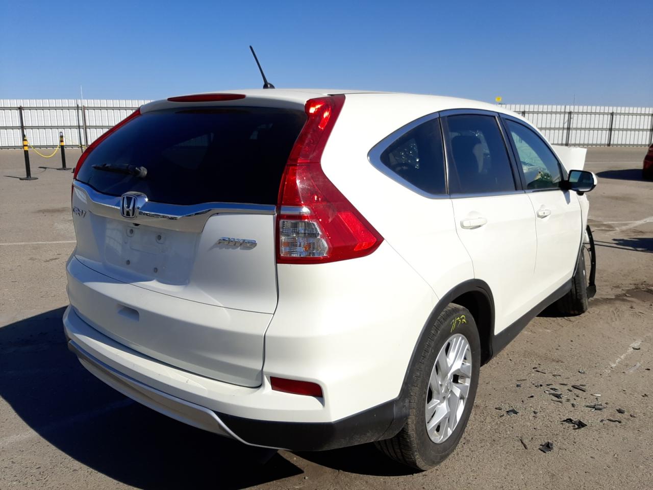 Photo 4 from auction – 2016 HONDA CR-V EX with VIN 5J6RM4H55GL067375