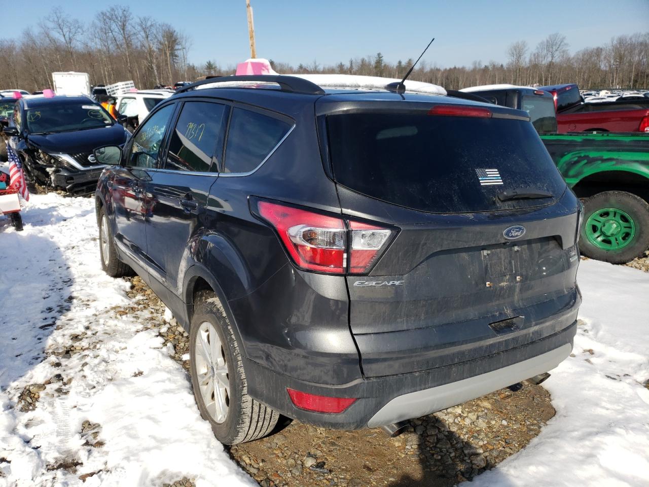 Photo 3 from auction – 2018 FORD ESCAPE SE with VIN 1FMCU0GD4JUA11700