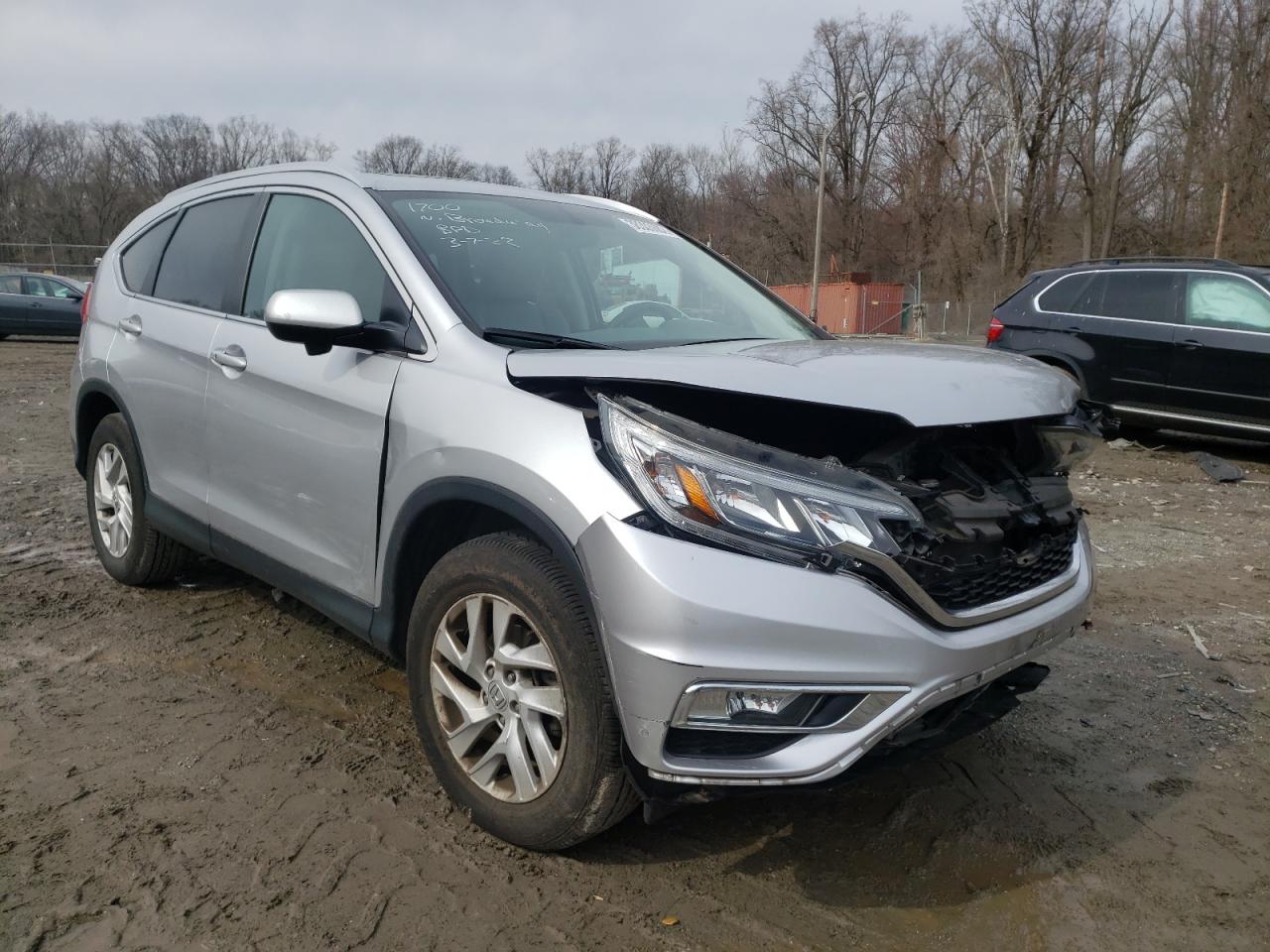 HONDA CR-V EXL 2015 with VIN 2HKRM4H77FH701764 - Photo from auction