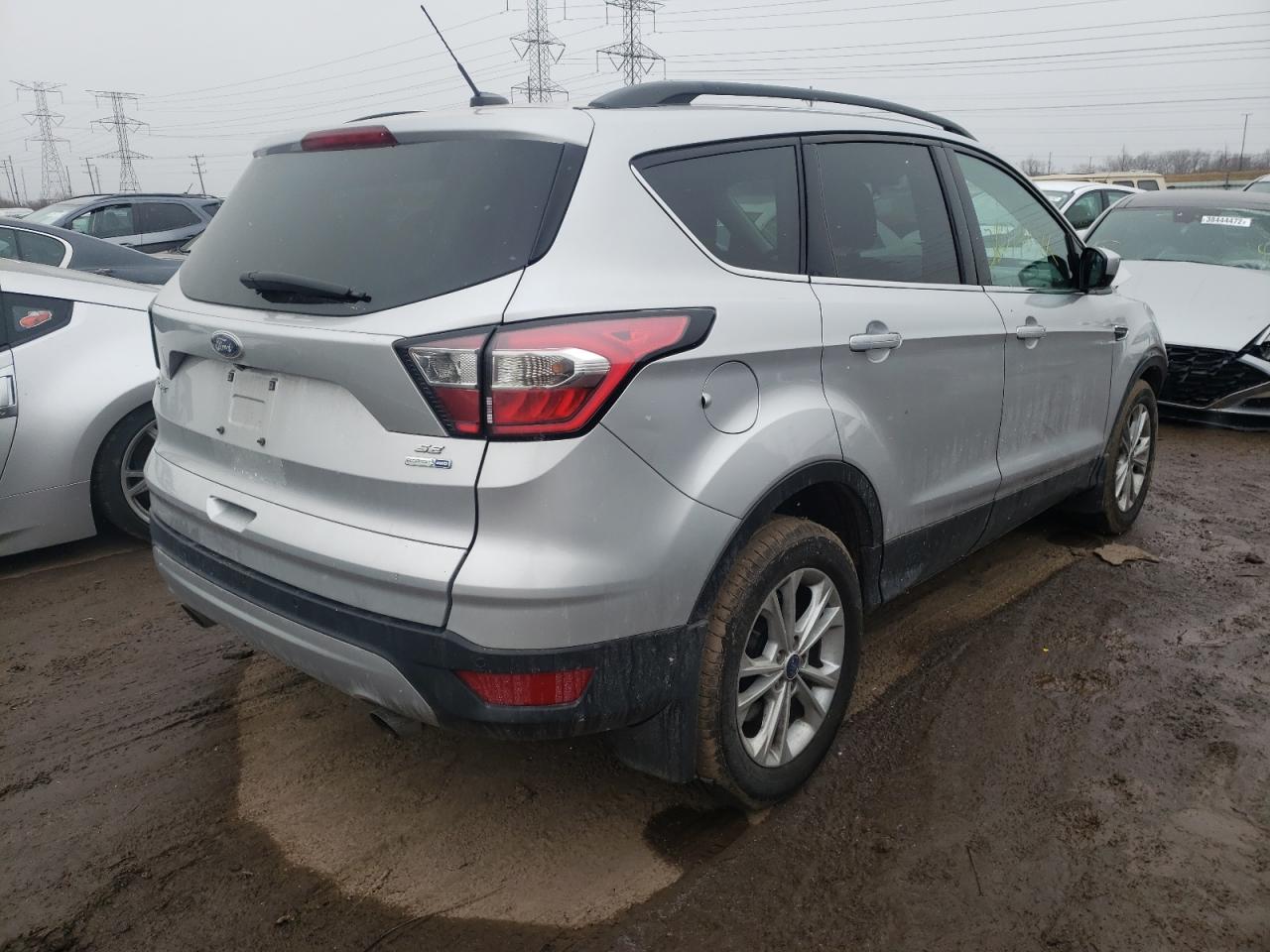 Photo 4 from auction – 2017 FORD ESCAPE SE with VIN 1FMCU9GD6HUE79667