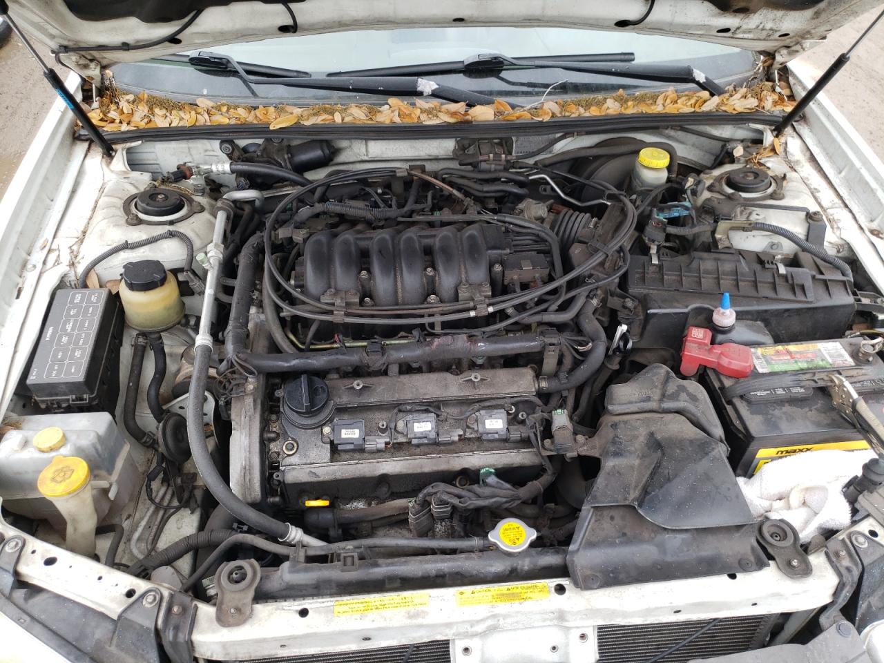 Photo 7 from auction – 2000 NISSAN MAXIMA GLE with VIN JN1CA31D0YT747155