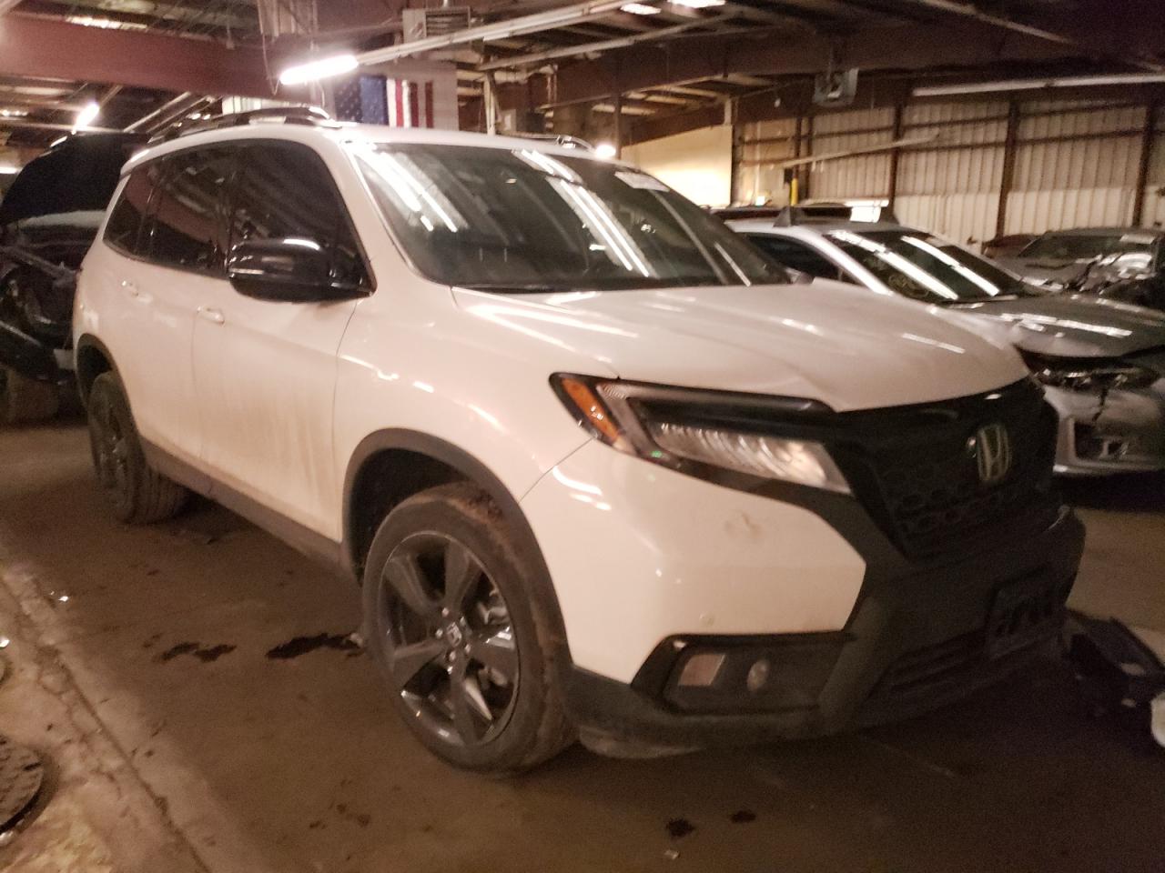 HONDA PASSPORT E 2020 with VIN 5FNYF8H04LB000884 - Photo from auction