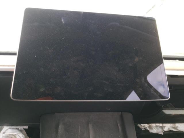 Photo 8 from auction – 2021 TESLA MODEL Y with VIN 5YJYGDEE0MF190643