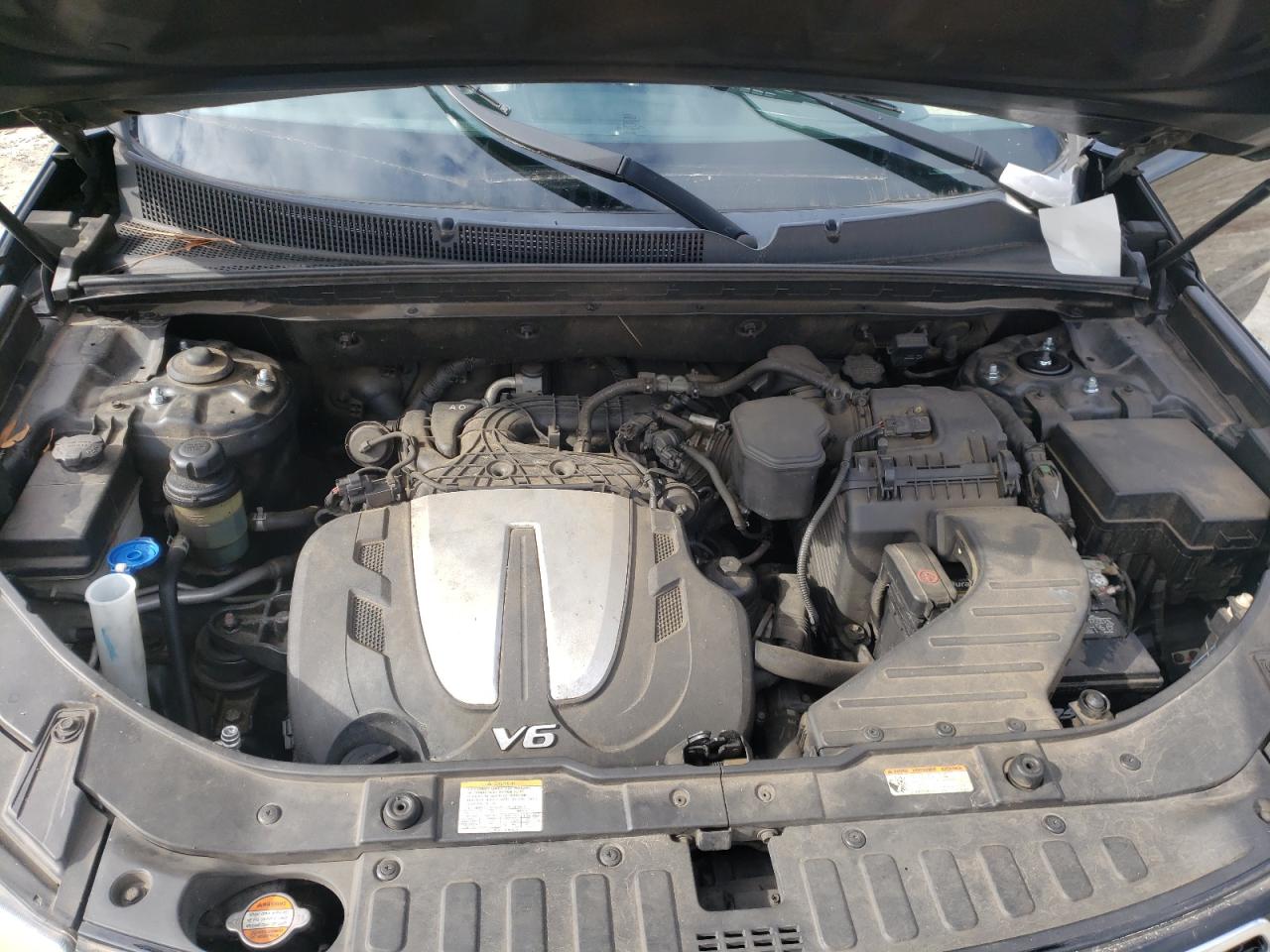 Photo 7 from auction – 2012 KIA SORENTO SX with VIN 5XYKW4A28CG213548