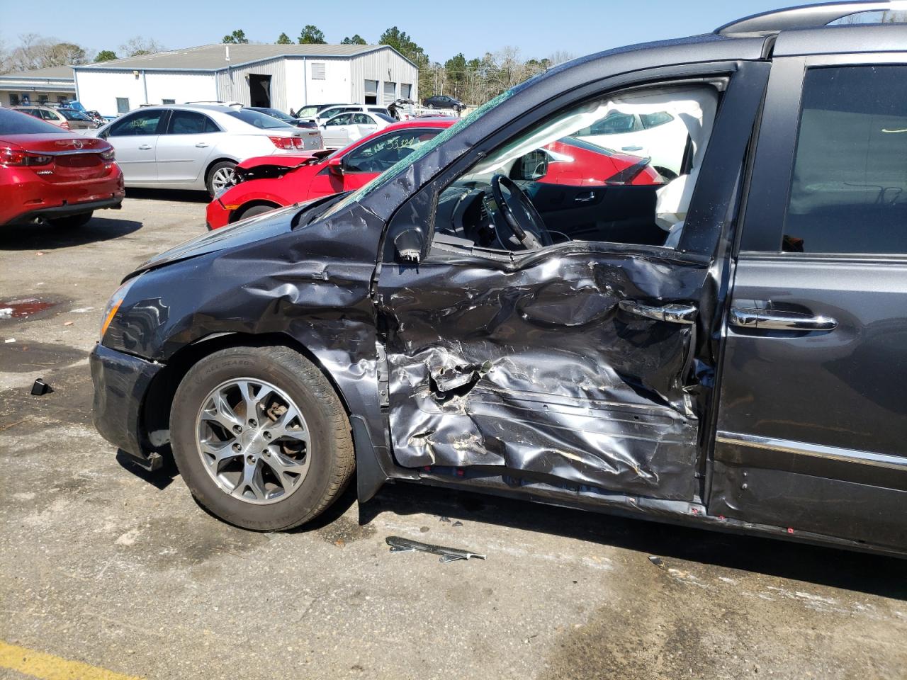 Photo 10 from auction – 2014 KIA SEDONA EX with VIN KNDMH4C70E6587315