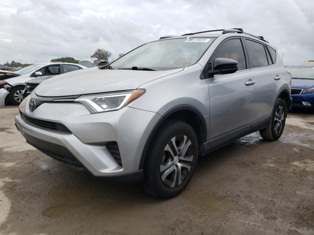 Photo 2 from auction – 2018 TOYOTA RAV4 LE with VIN JTMZFREVXJJ162020