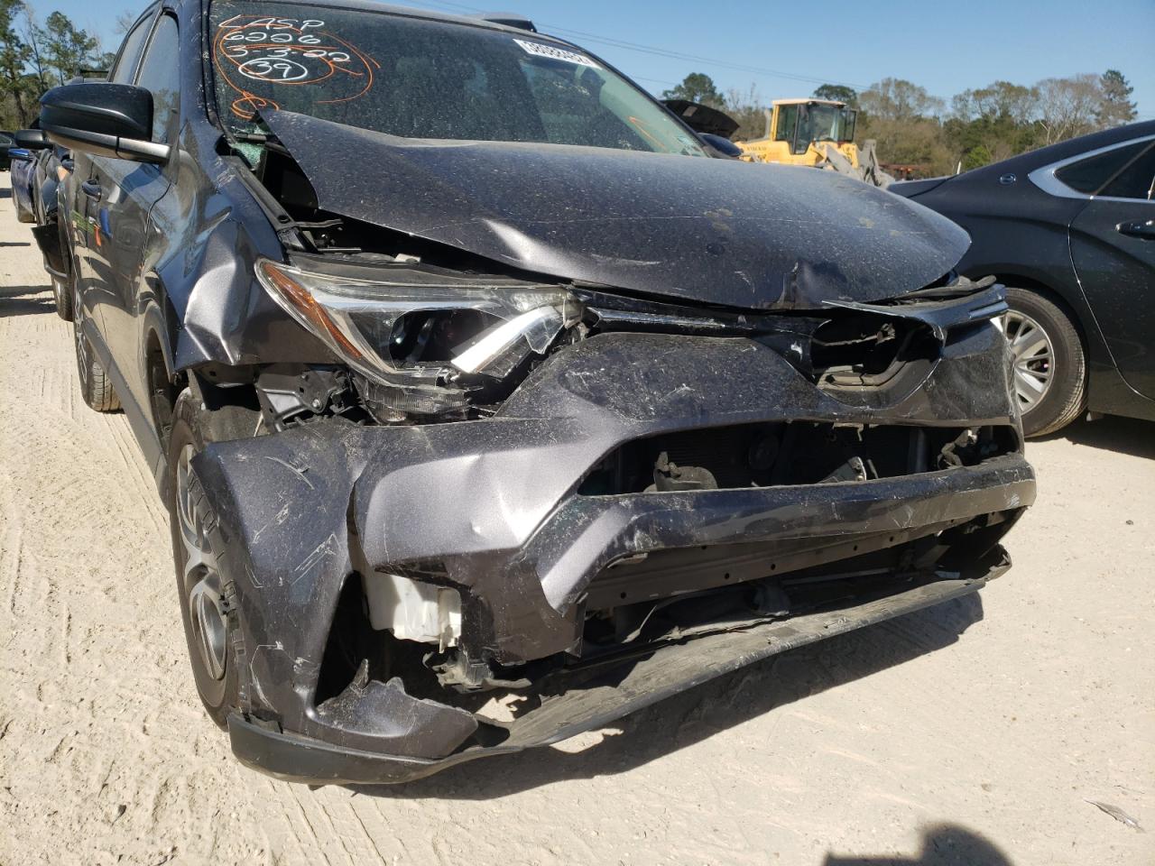 Photo 9 from auction – 2016 TOYOTA RAV4 LE with VIN JTMZFREV4GJ077540