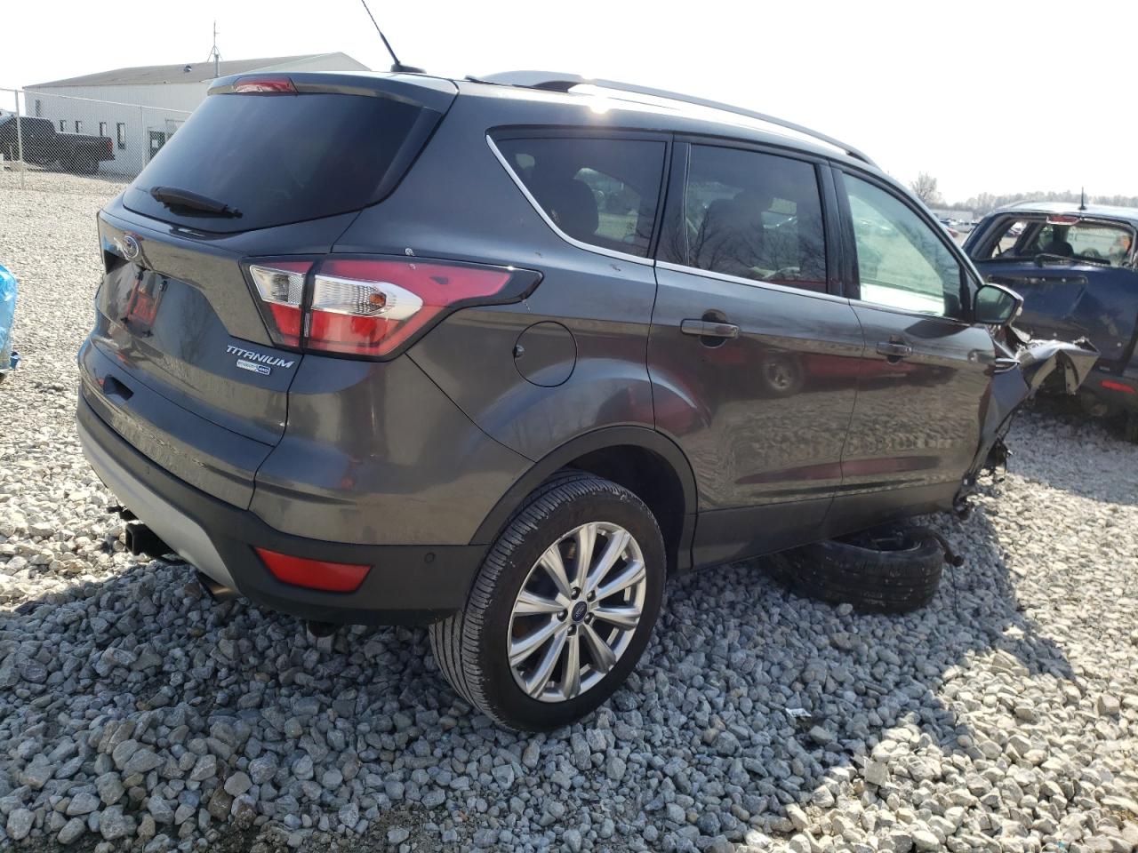 Photo 4 from auction – 2017 FORD ESCAPE TIT with VIN 1FMCU9J92HUB01284