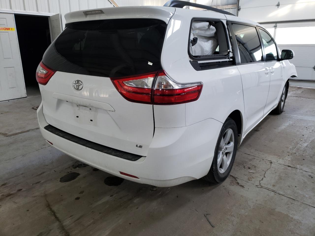 Photo 4 from auction – 2015 TOYOTA SIENNA LE with VIN 5TDKK3DCXFS656334