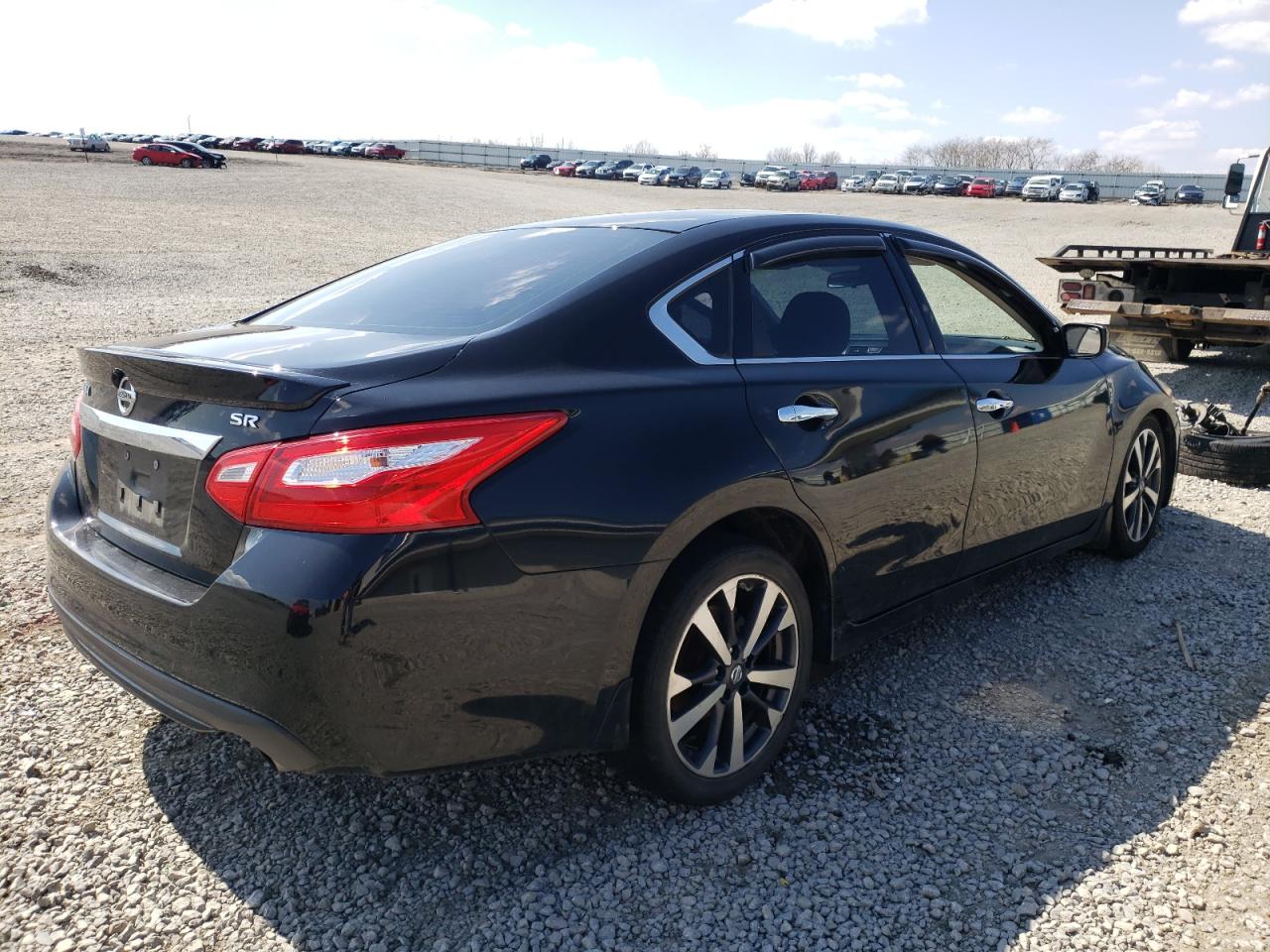 Photo 4 from auction – 2016 NISSAN ALTIMA SR with VIN 1N4AL3AP6GC136401