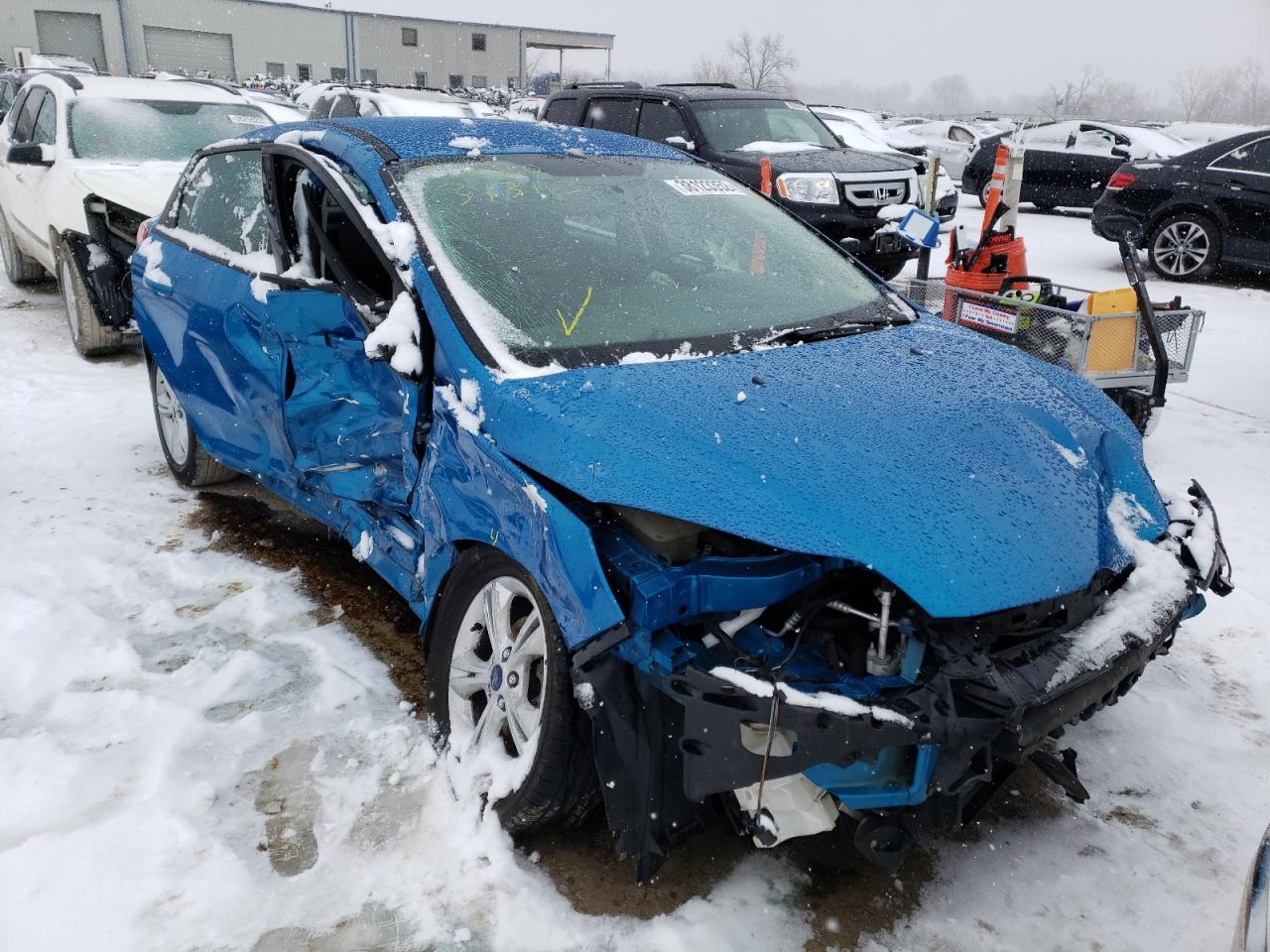 FORD FOCUS SE 2014 with VIN 1FADP3F23EL393463 - Photo from auction