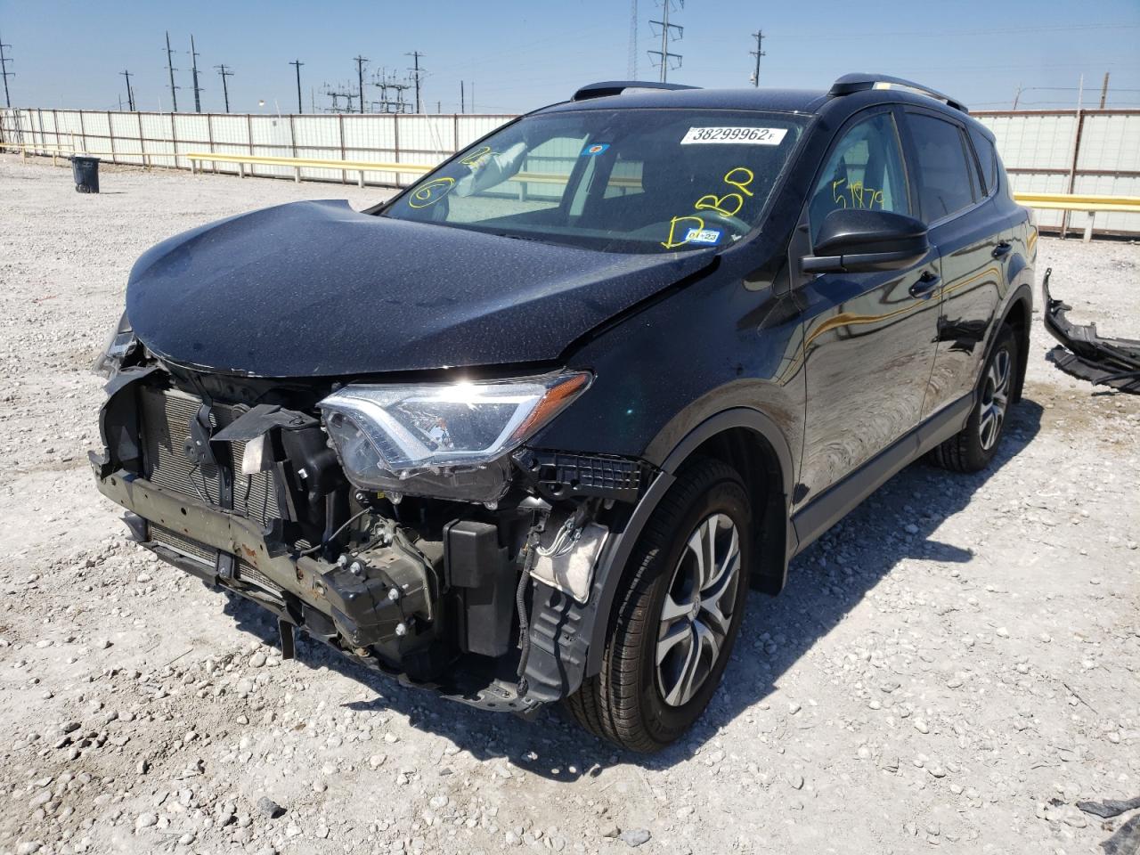 Photo 2 from auction – 2018 TOYOTA RAV4 LE with VIN 2T3BFREV5JW715532