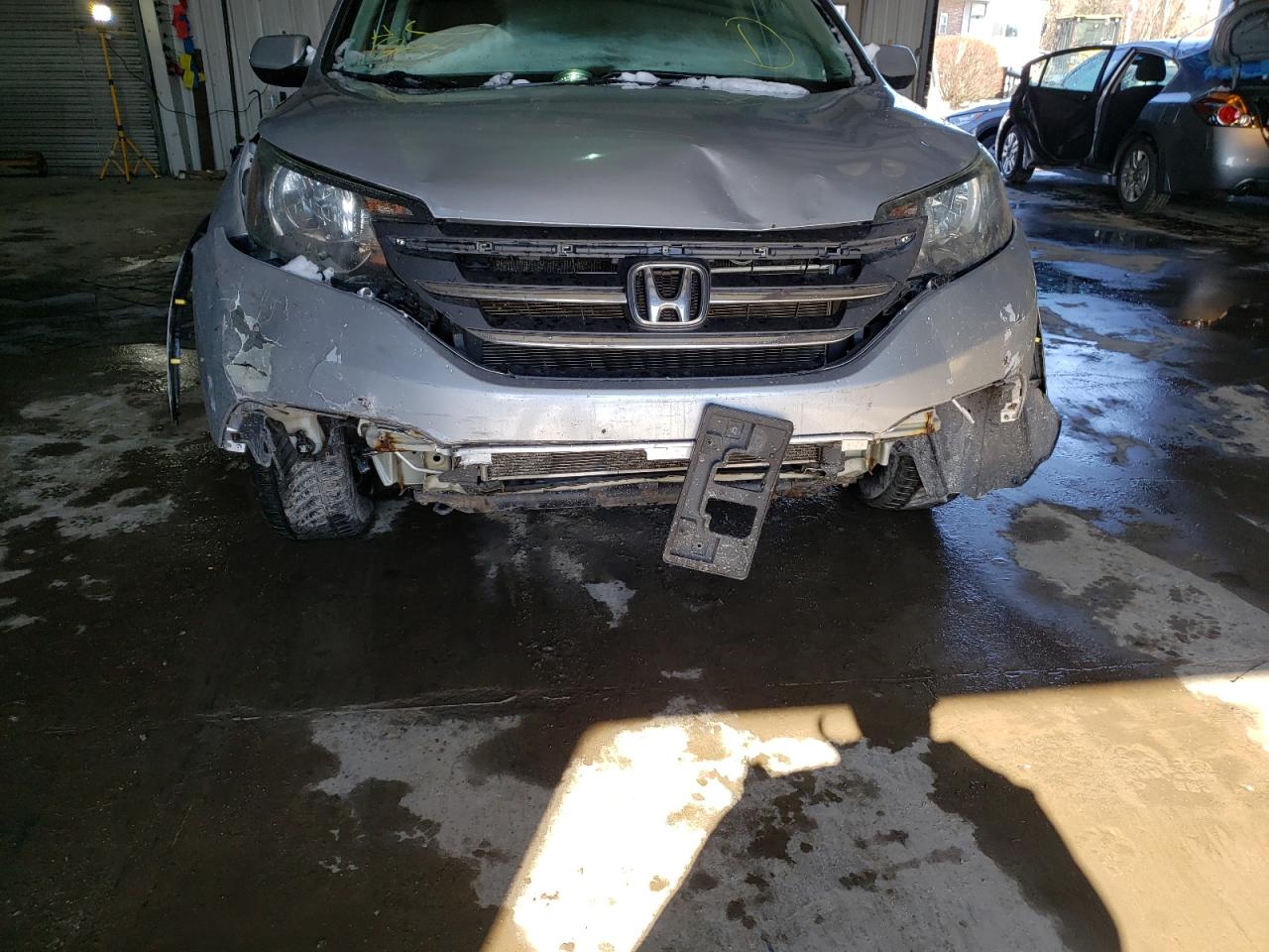 Photo 9 from auction – 2012 HONDA CR-V EX with VIN 2HKRM4H56CH601147