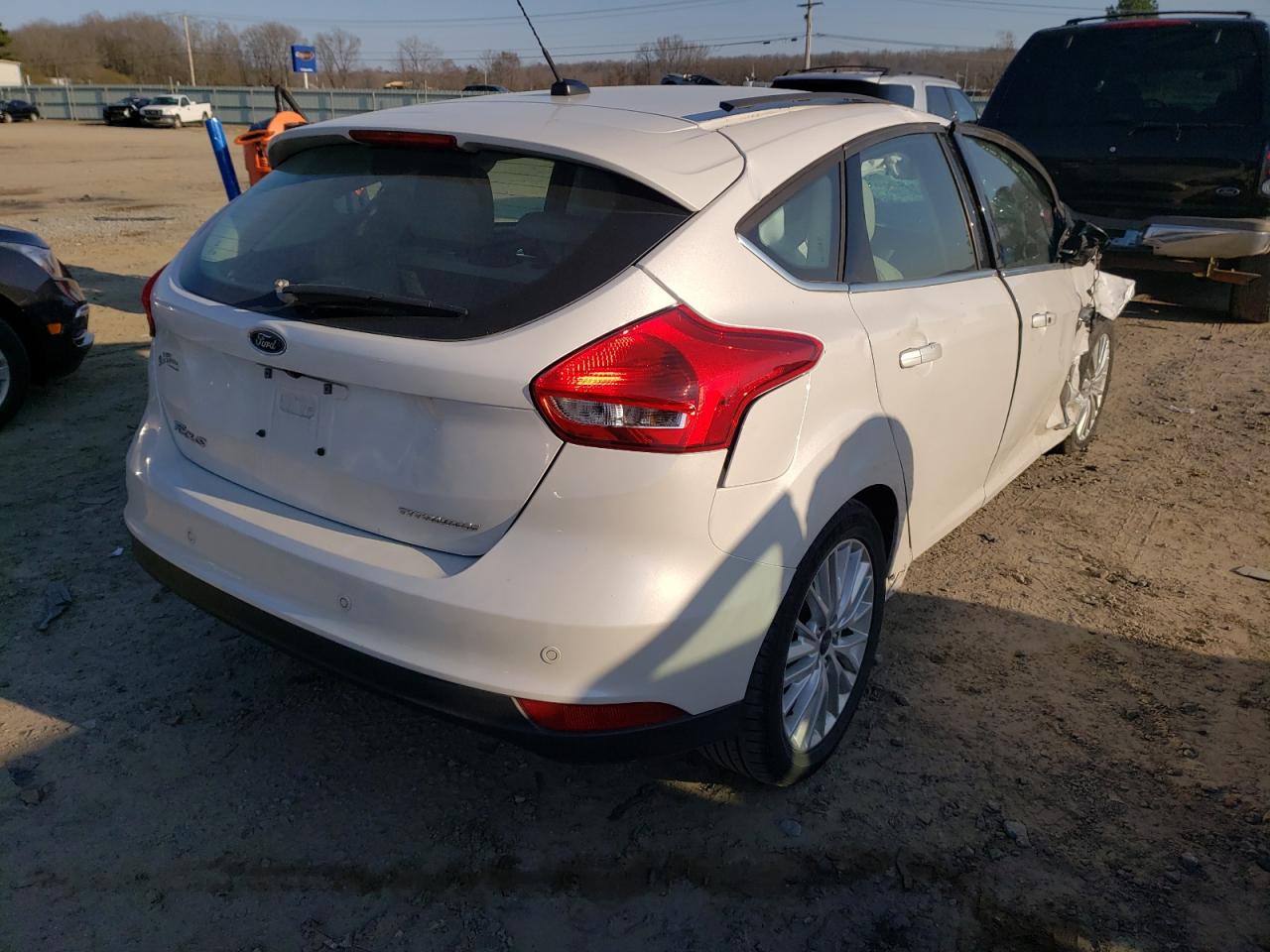 Photo 4 from auction – 2016 FORD FOCUS TITA with VIN 1FADP3N29GL321333
