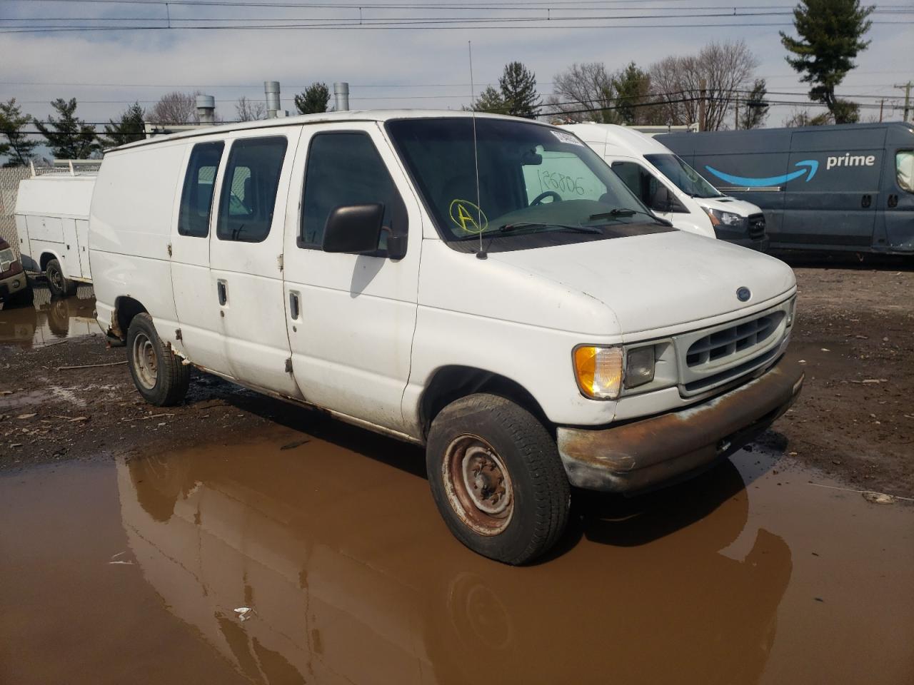 FORD ECONOLINE 1999 with VIN 1FTPE2429XHA70339 - Photo from auction
