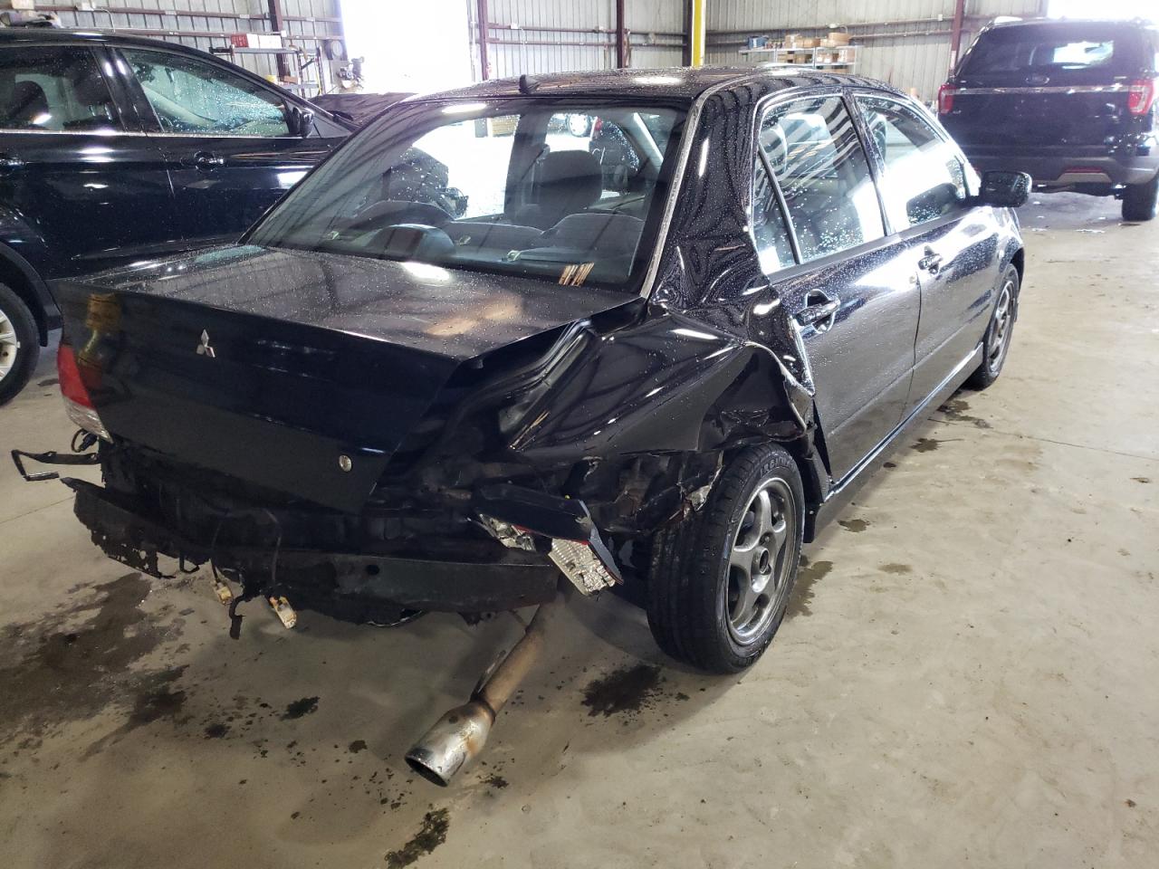 Photo 4 from auction – 2002 MITSUBISHI LANCER with VIN JA3AJ86E32U029540