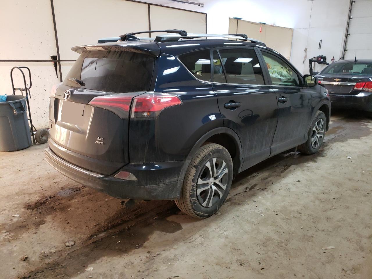 Photo 4 from auction – 2018 TOYOTA RAV4 LE with VIN JTMBFREV7JJ736588