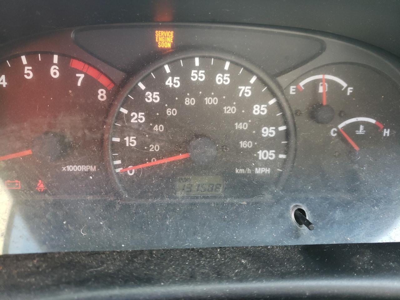 Photo 8 from auction – 2000 CHEVROLET TRACKER with VIN 2CNBJ13C6Y6927729