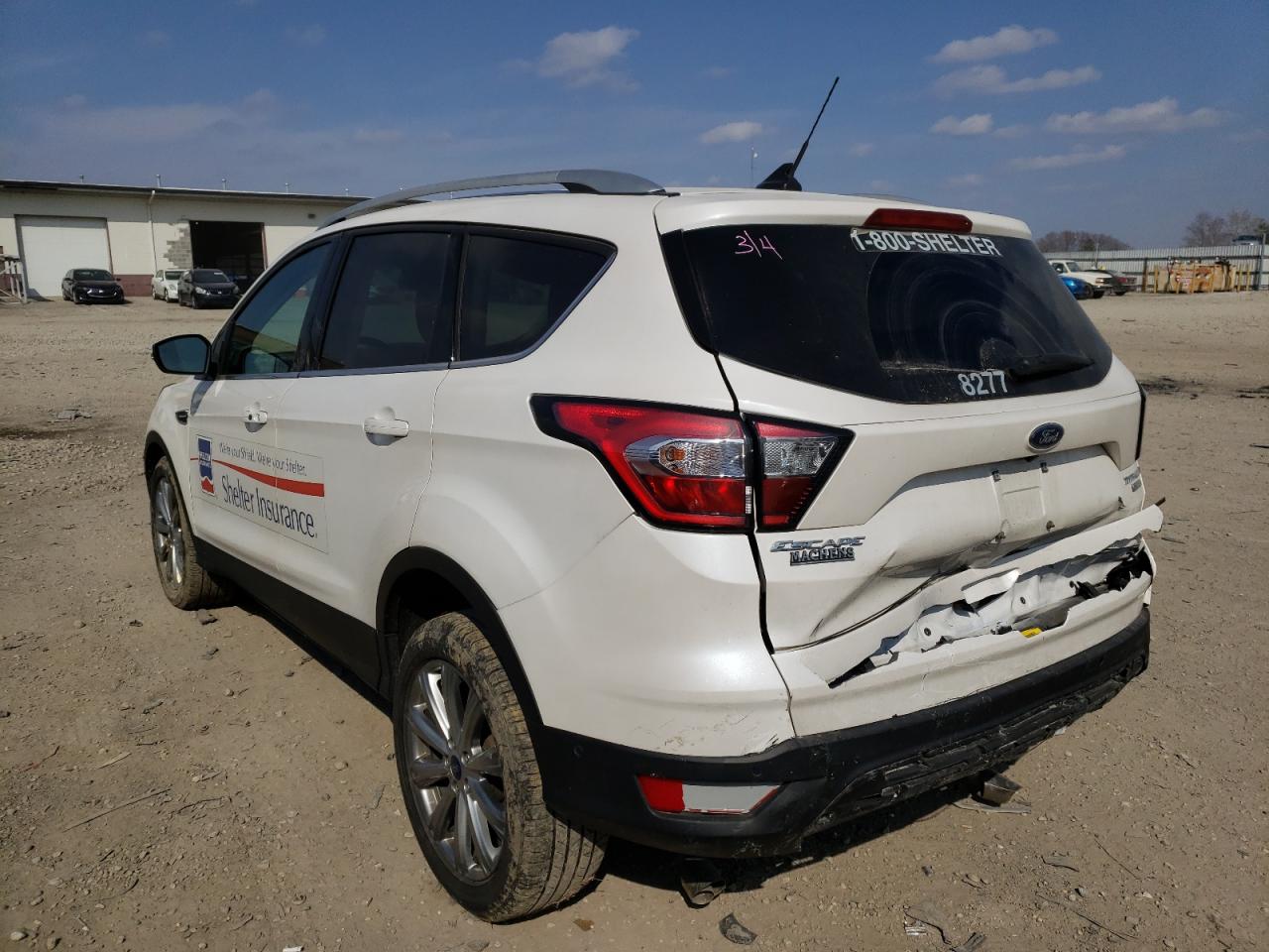 Photo 3 from auction – 2018 FORD ESCAPE TIT with VIN 1FMCU0J90JUD06135