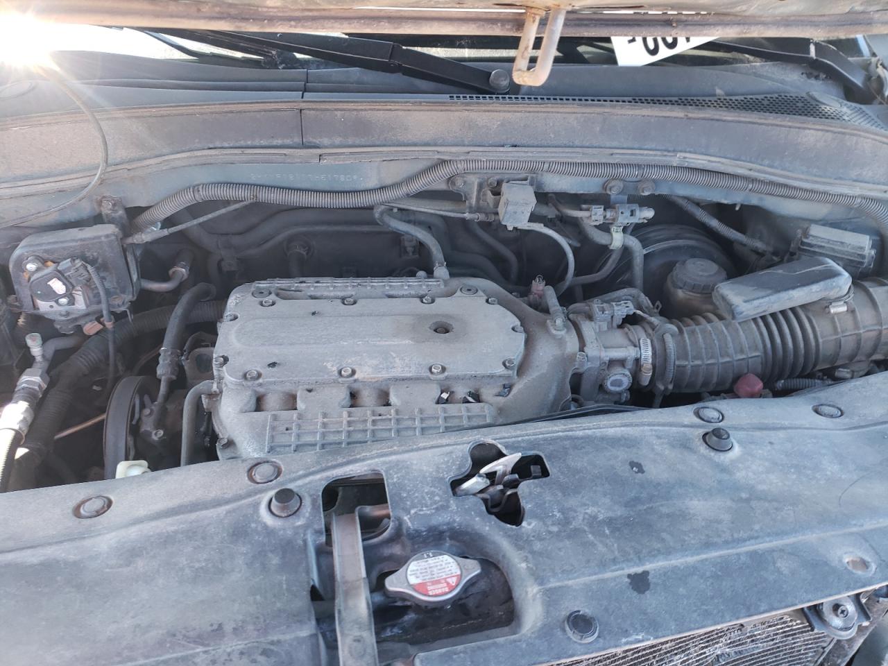 Photo 7 from auction – 2007 HONDA PILOT LX with VIN 2HKYF18117H517809