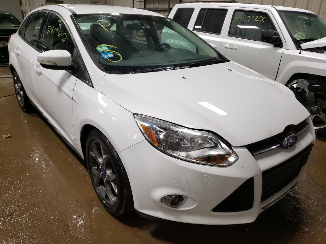 FORD FOCUS SE 2013 with VIN 1FADP3F26DL308596 - Photo from auction