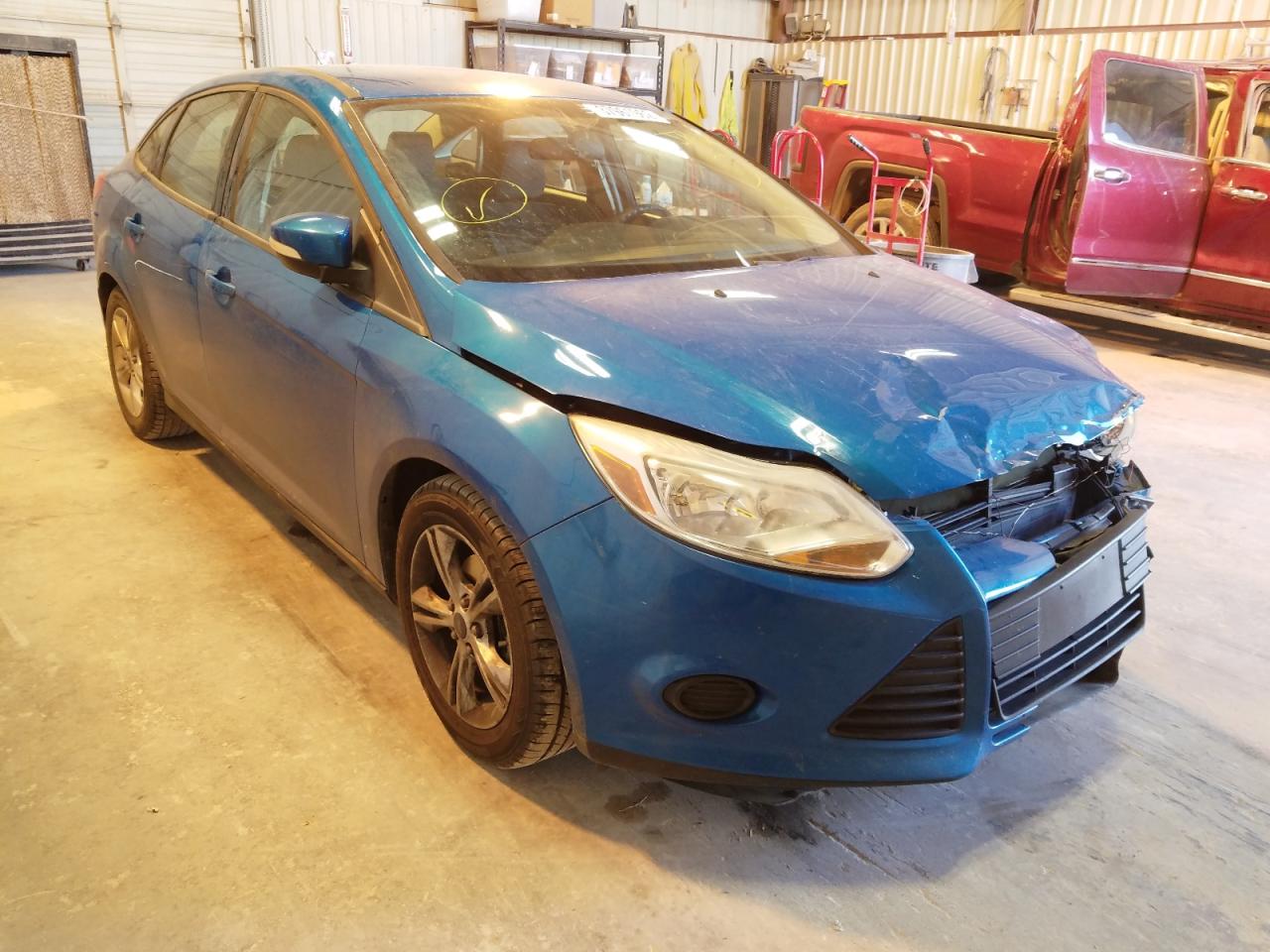 FORD FOCUS SE 2014 with VIN 1FADP3F21EL137967 - Photo from auction