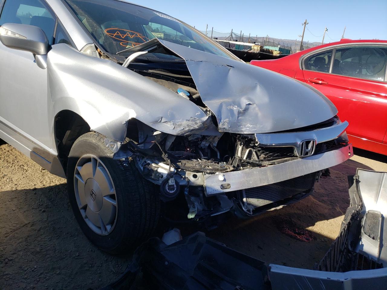 Photo 9 from auction – 2010 HONDA CIVIC HYBR with VIN JHMFA3F28AS001872