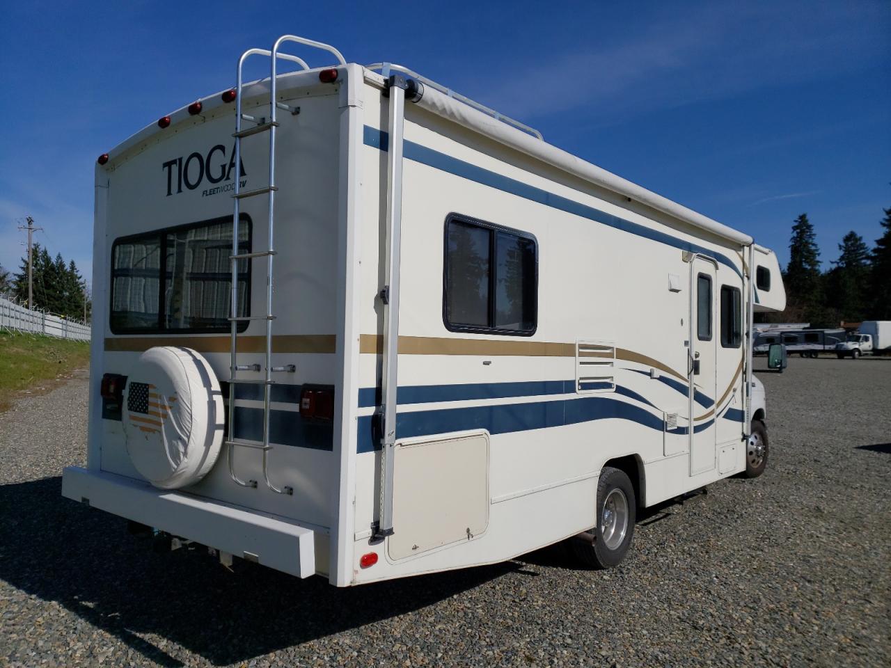 Photo 4 from auction – 2000 FORD TIOGA with VIN 1FDXE40S0XHB13558