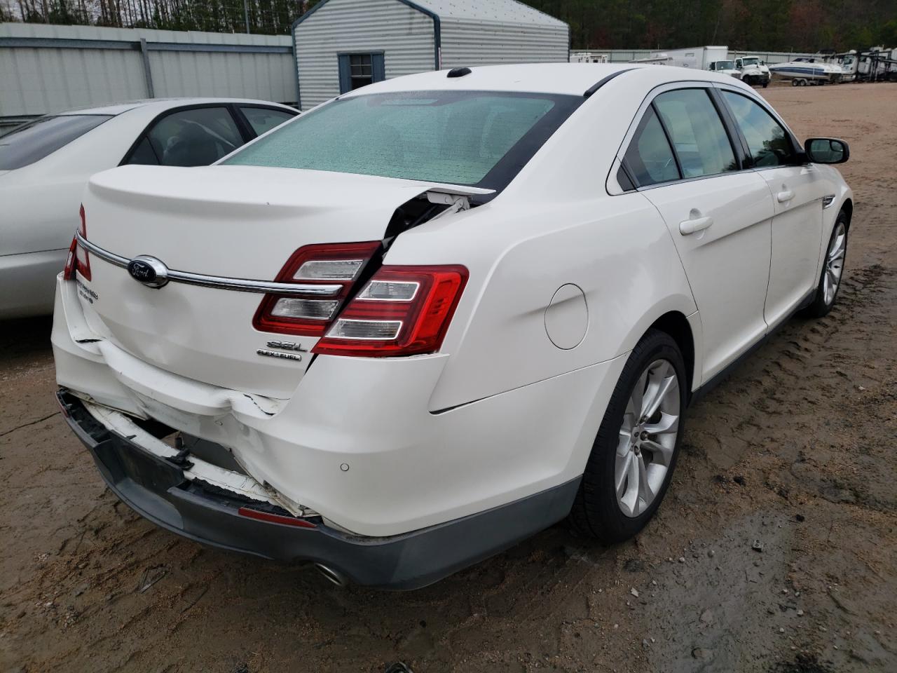 Photo 4 from auction – 2013 FORD TAURUS SEL with VIN 1FAHP2E83DG140068