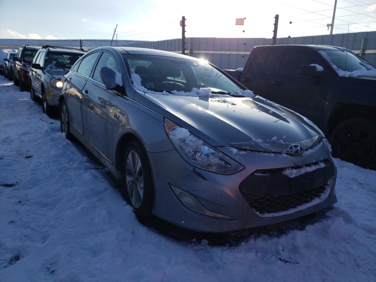 HYUNDAI SONATA HYB 2015 with VIN KMHEC4A48FA124554 - Photo from auction