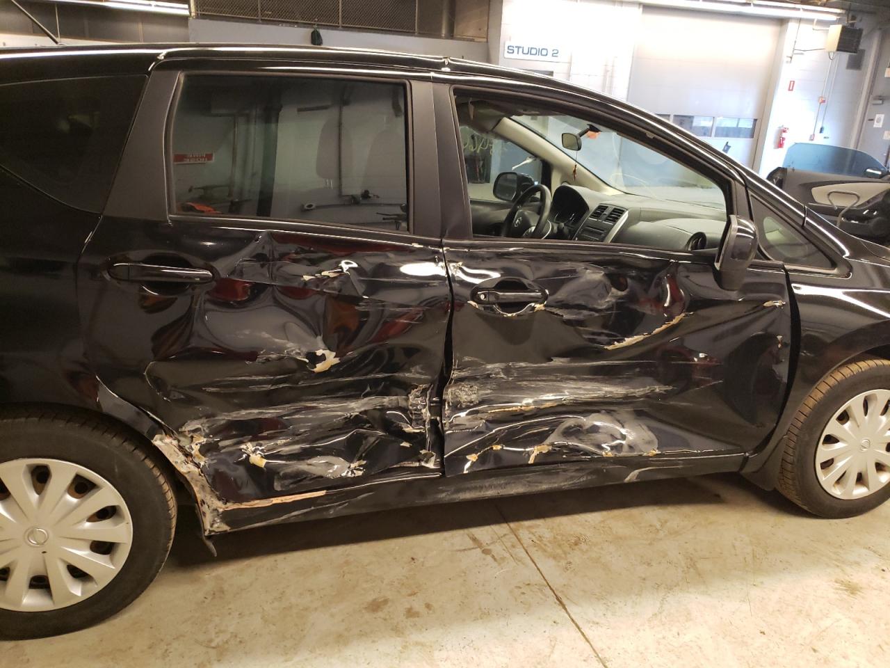 Foto 9 de la subasta – 2014 NISSAN VERSA con VIN 3N1CE2CP6EL373513