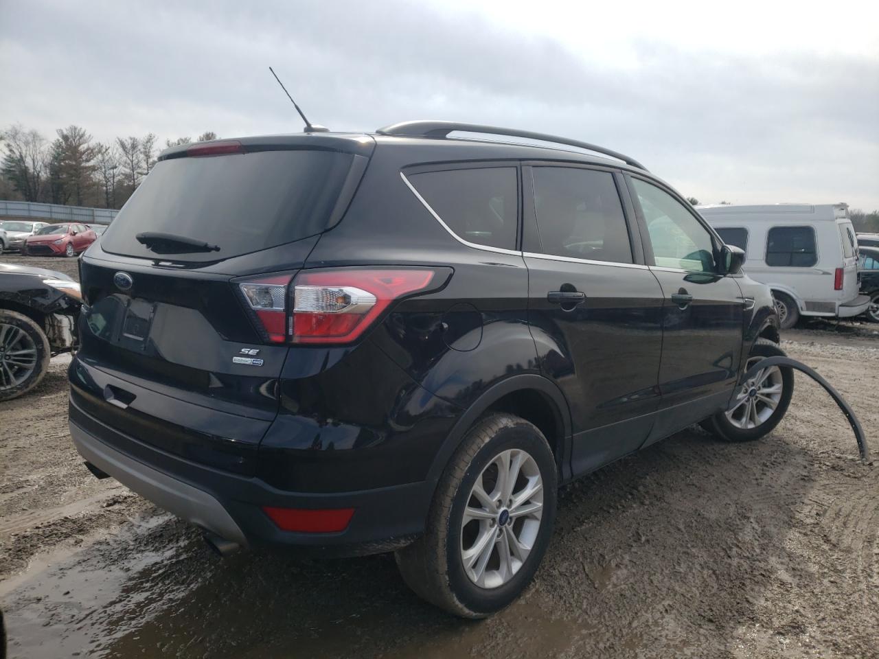 Photo 4 from auction – 2018 FORD ESCAPE SE with VIN 1FMCU9GD1JUC62999