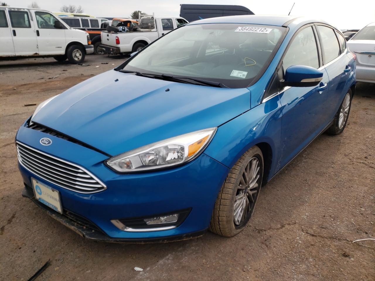 Photo 2 from auction – 2015 FORD FOCUS TITA with VIN 1FADP3N2XFL261691