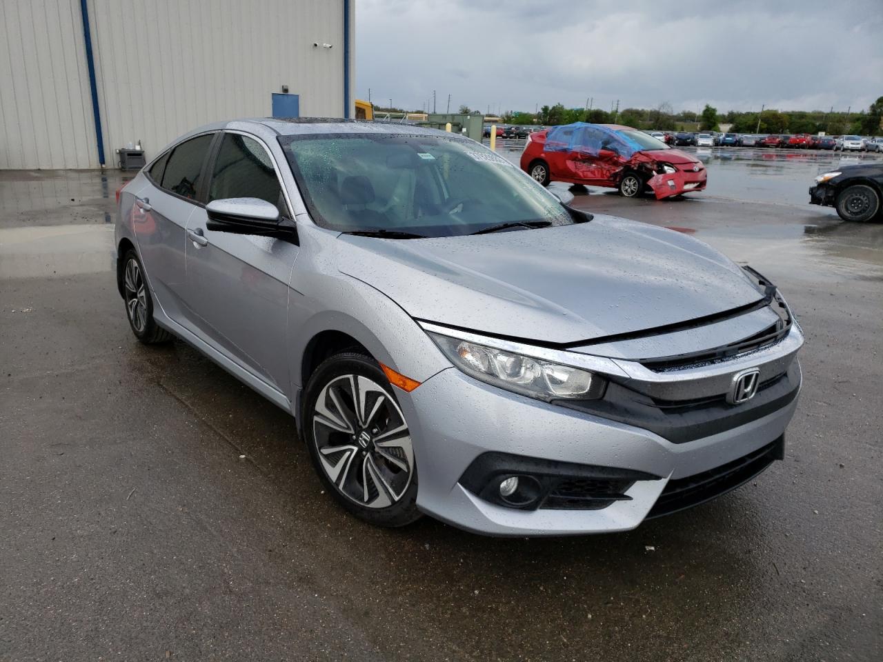 HONDA CIVIC EXL 2016 with VIN 19XFC1F79GE011141 - Photo from auction