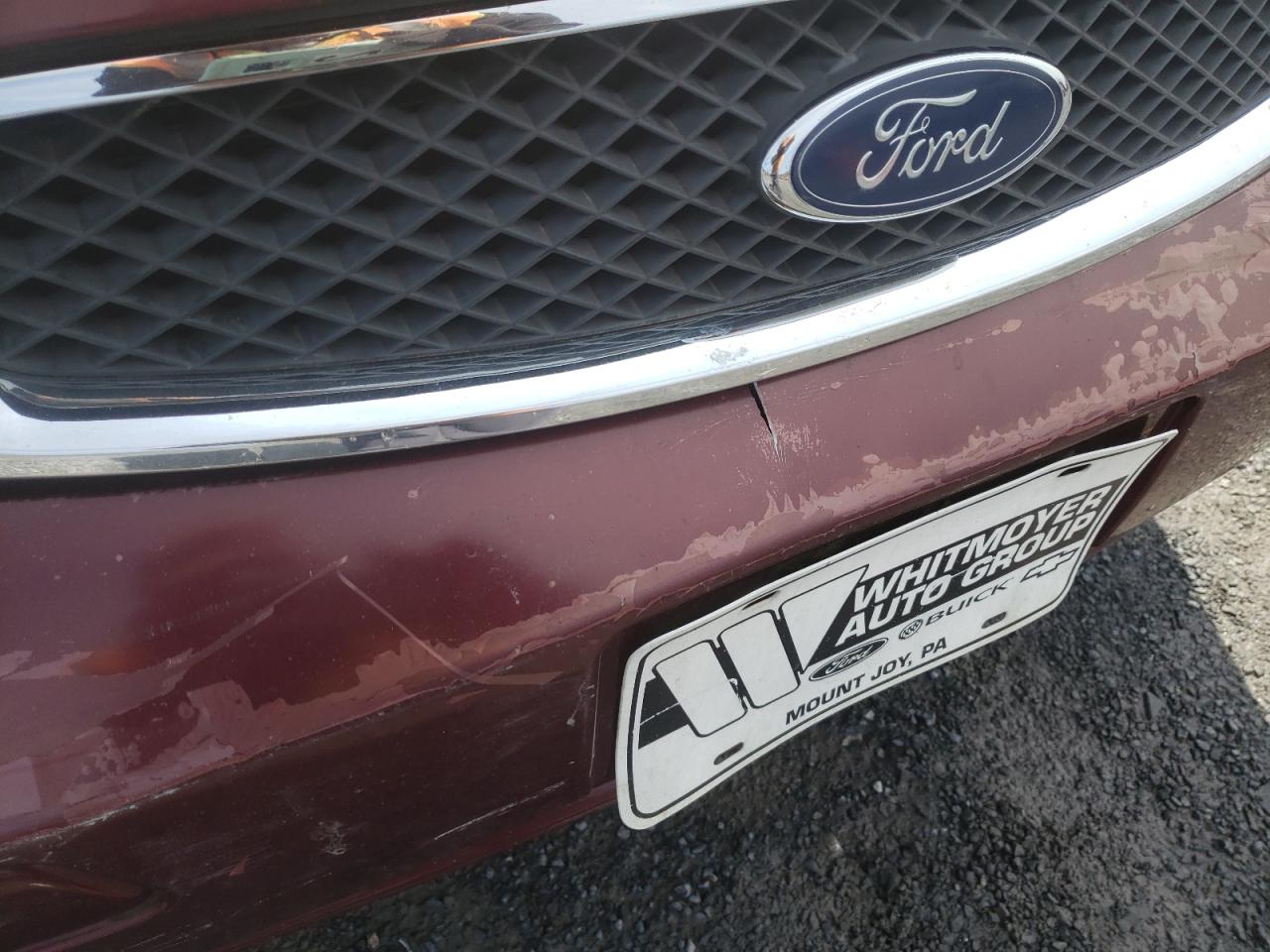 Photo 9 from auction – 2007 FORD FOCUS ZX4 with VIN 1FAHP34N27W195571