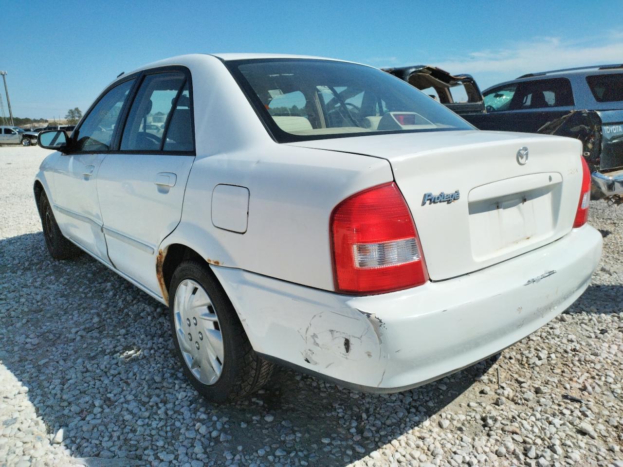 Photo 3 from auction – 2002 MAZDA PROTEGE DX with VIN JM1BJ225920534059