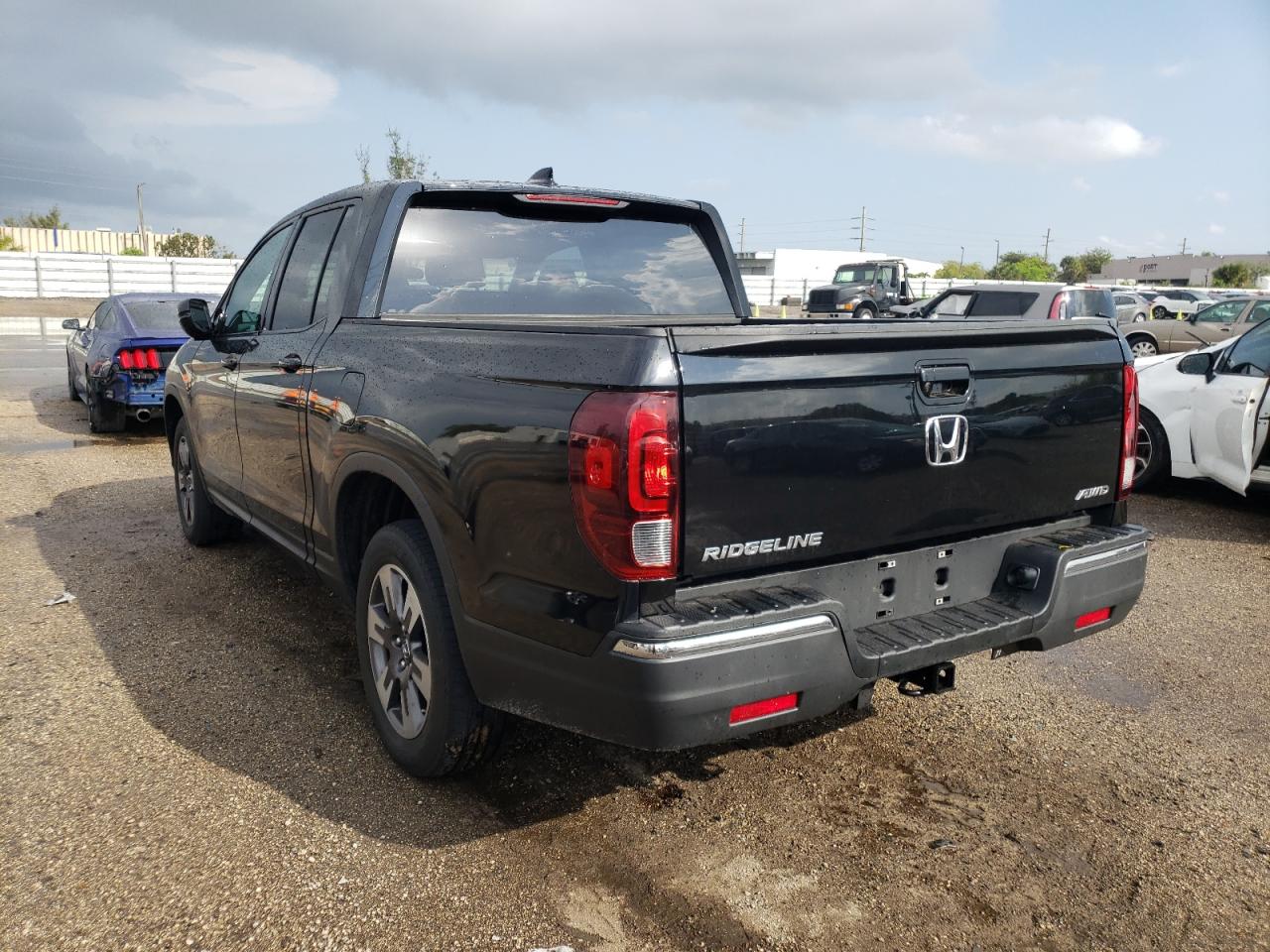 Photo 3 from auction – 2019 HONDA RIDGELINE with VIN 5FPYK3F12KB049307