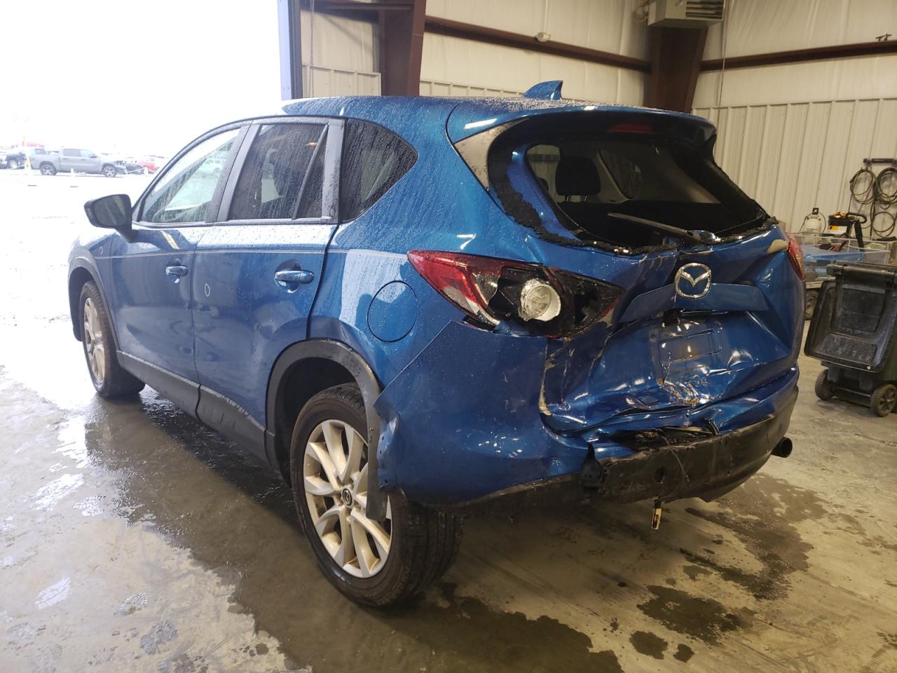 Photo 3 from auction – 2013 MAZDA CX-5 GT with VIN JM3KE4DEXD0141890