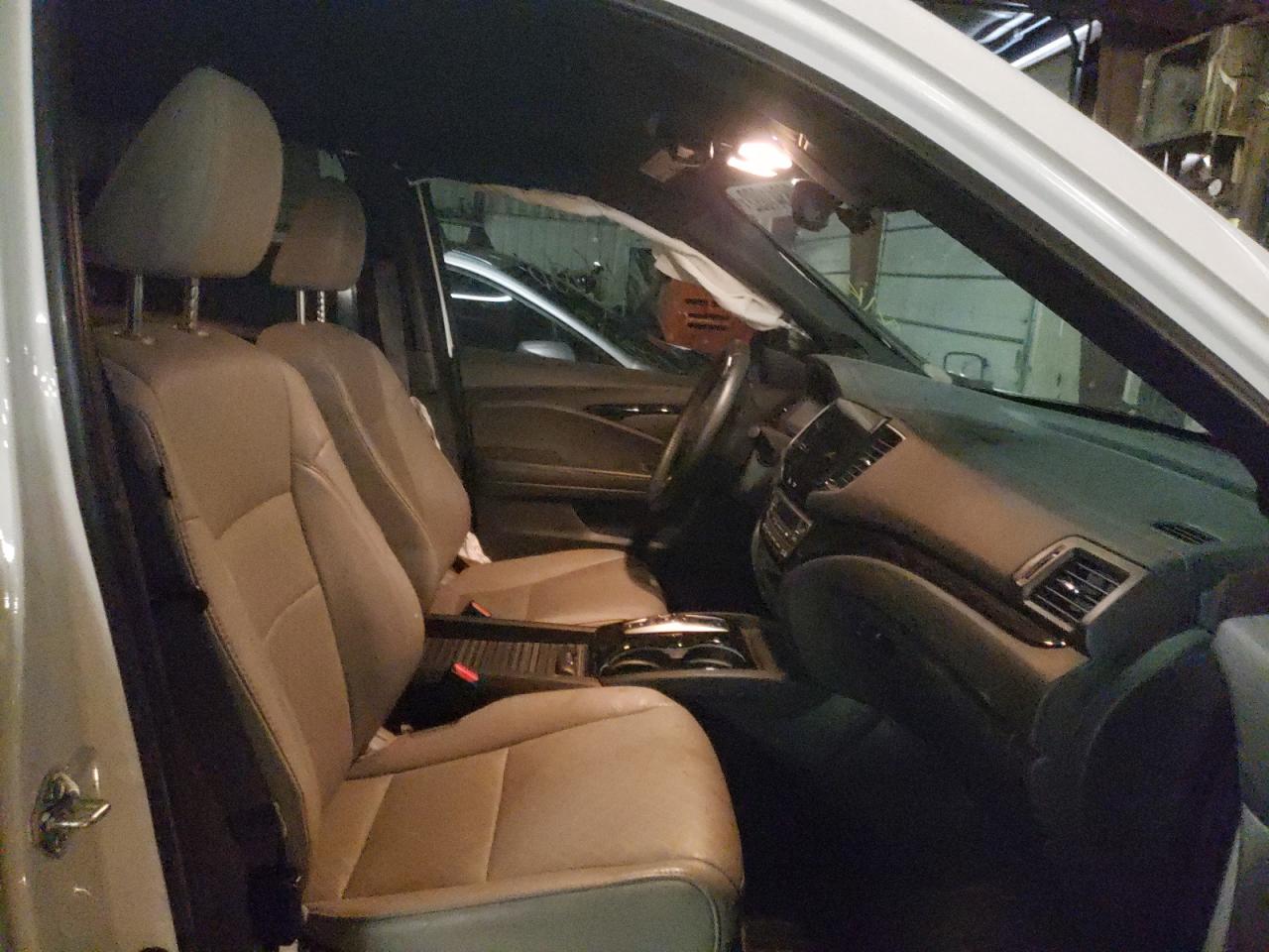 Photo 5 from auction – 2020 HONDA PASSPORT E with VIN 5FNYF8H04LB000884