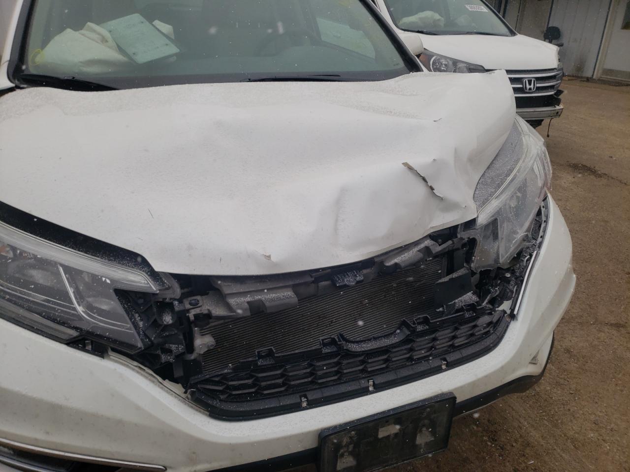 Photo 9 from auction – 2015 HONDA CR-V EX with VIN 5J6RM4H54FL129721