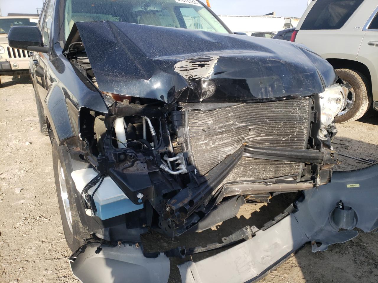 Photo 9 from auction – 2012 FORD ESCAPE LIM with VIN 1FMCU0EG0CKB29013