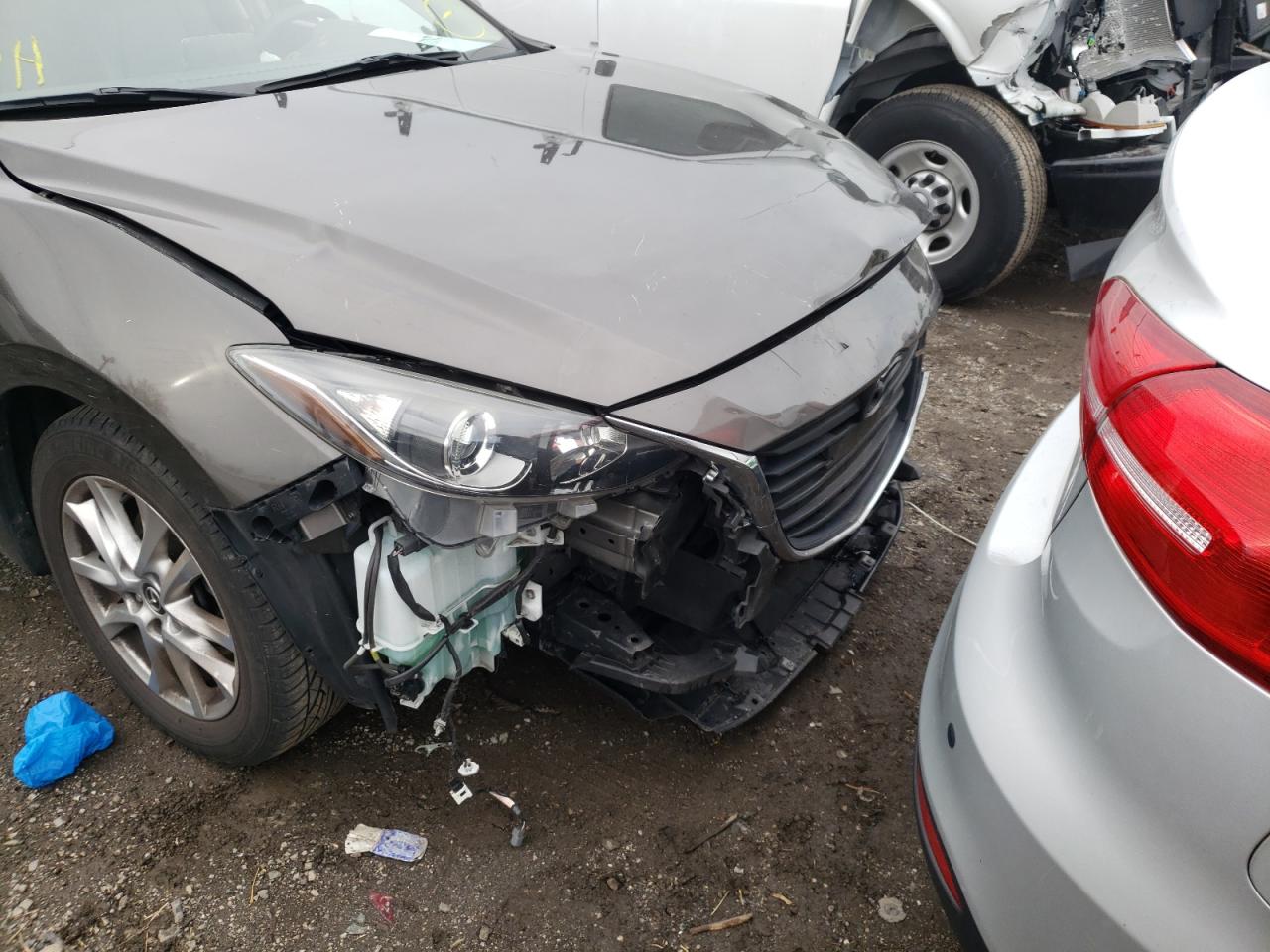 Photo 9 from auction – 2014 MAZDA 3 GRAND TO with VIN JM1BM1M70E1195061