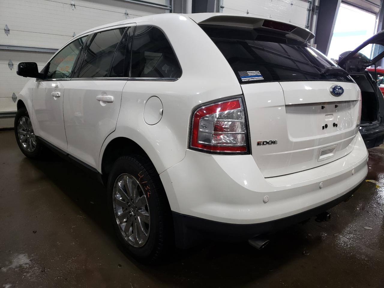 Photo 3 from auction – 2010 FORD EDGE LIMIT with VIN 2FMDK4KC1ABB57042