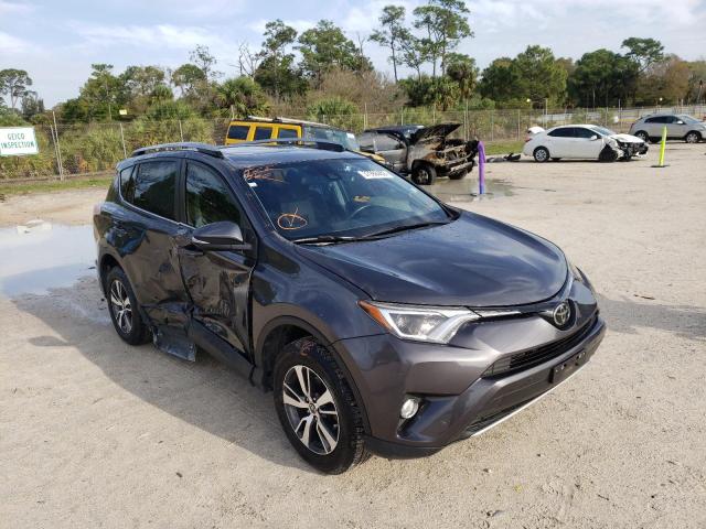 TOYOTA RAV4 XLE 2017 with VIN JTMWFREVXHJ706982 - Photo from auction