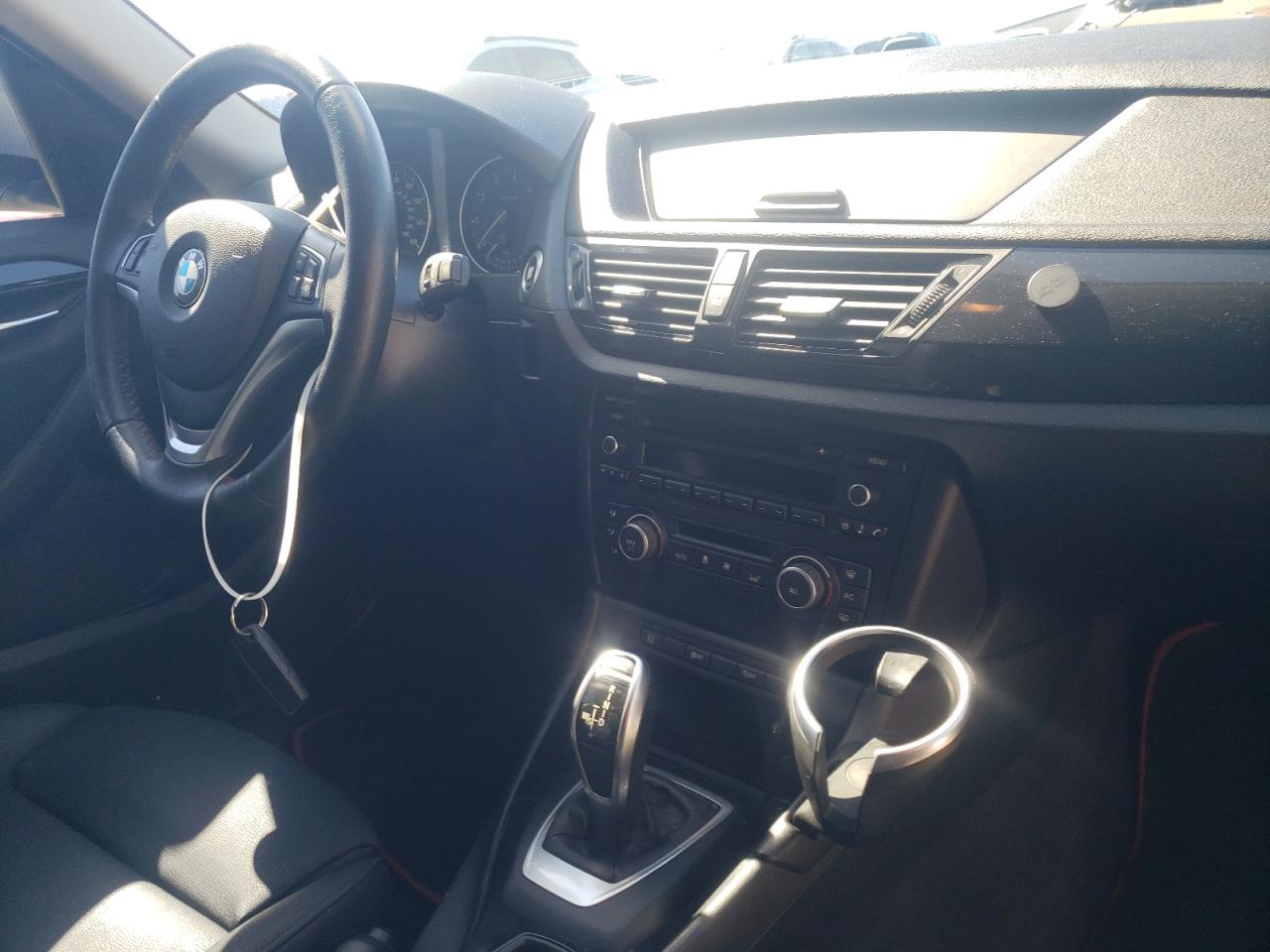 Photo 9 from auction – 2013 BMW X1 SDRIVE2 with VIN WBAVM1C59DVW42620