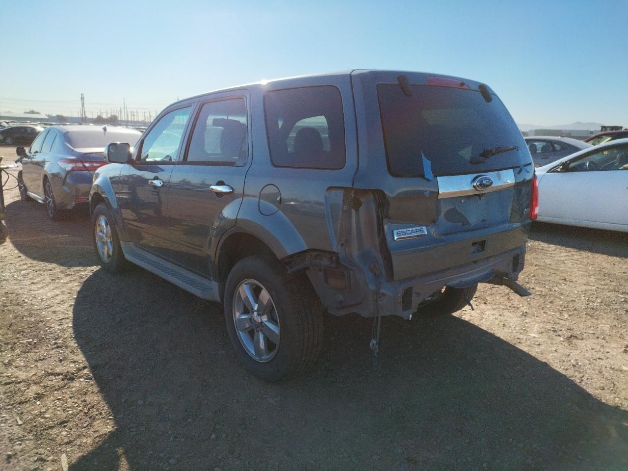 Photo 3 from auction – 2010 FORD ESCAPE LIM with VIN 1FMCU9EG6AKB63247