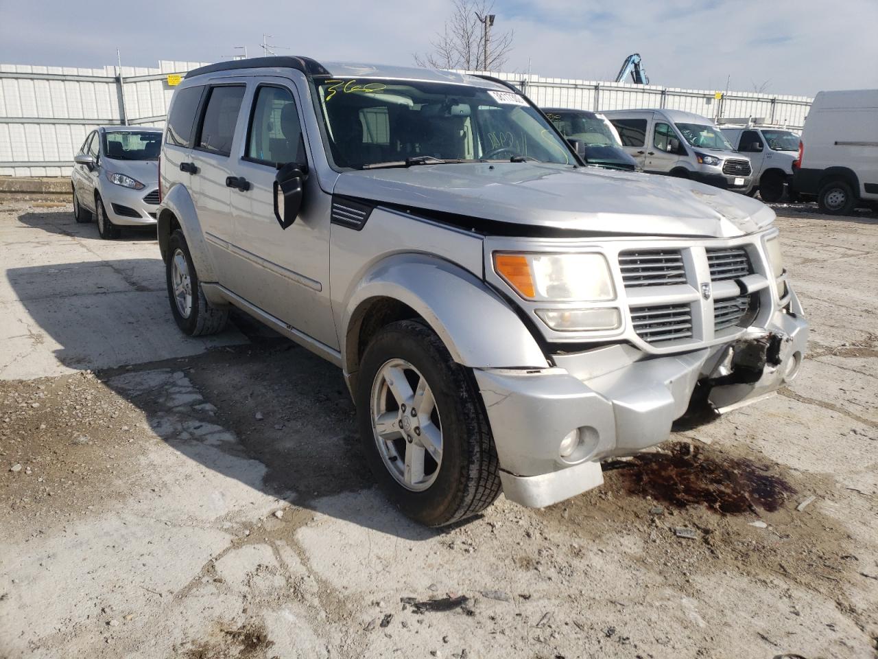 DODGE NITRO SXT 2011 with VIN 1D4PT5GK3BW541153 - Photo from auction