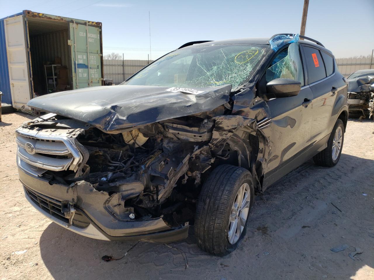 Photo 9 from auction – 2018 FORD ESCAPE SE with VIN 1FMCU9GD2JUC28151
