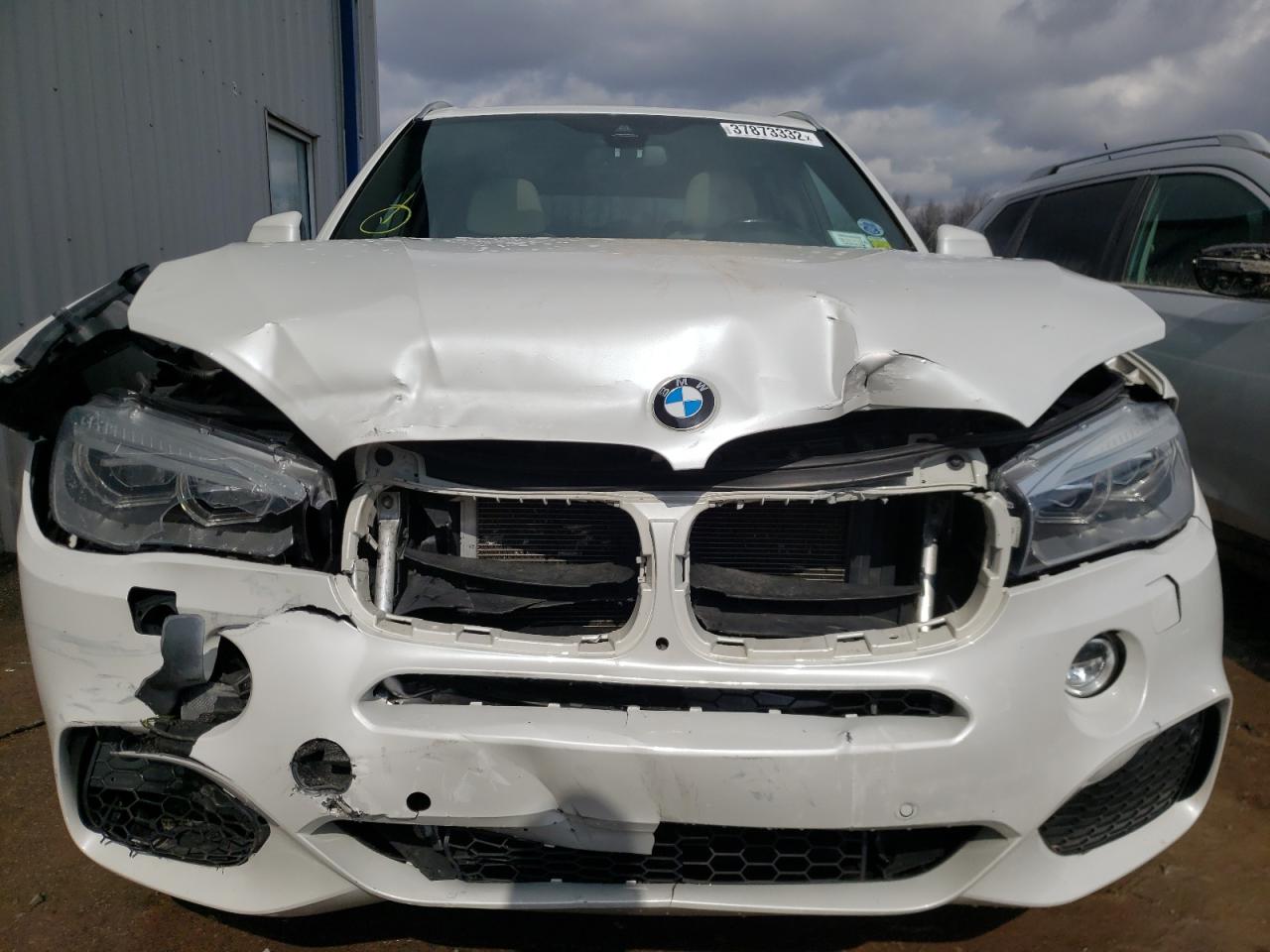 Photo 7 from auction – 2016 BMW X5 XDRIVE5 with VIN 5UXKR6C5XG0J79648
