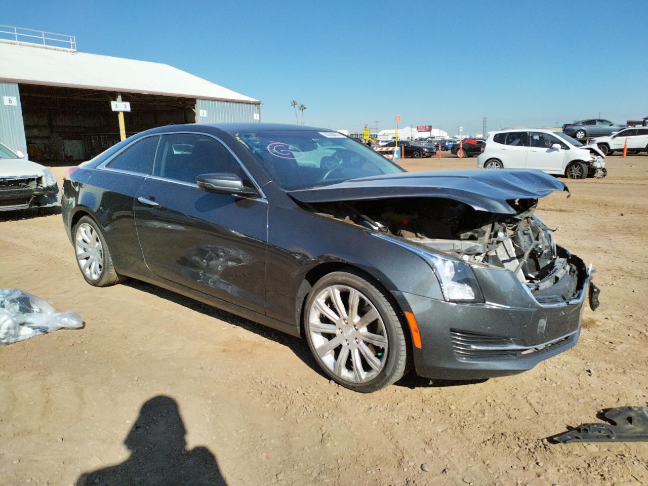 CADILLAC ATS 2016 with VIN 1G6AA1RX5G0147614 - Photo from auction